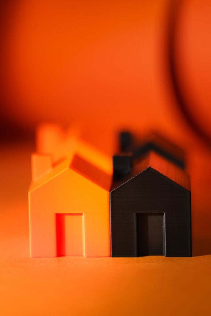 house 3d figurines real estate market orange background presentation vertical